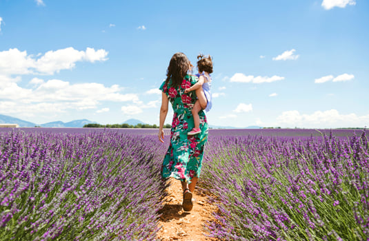 Woman walking in lavender fields